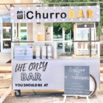 mobile churros and cotton candy, snow cones, sno cone, shaved ice vendors frozen cart company, sweet treat vendors perfect for parties and events, balloon vendor, backdrop, branding, churro bar